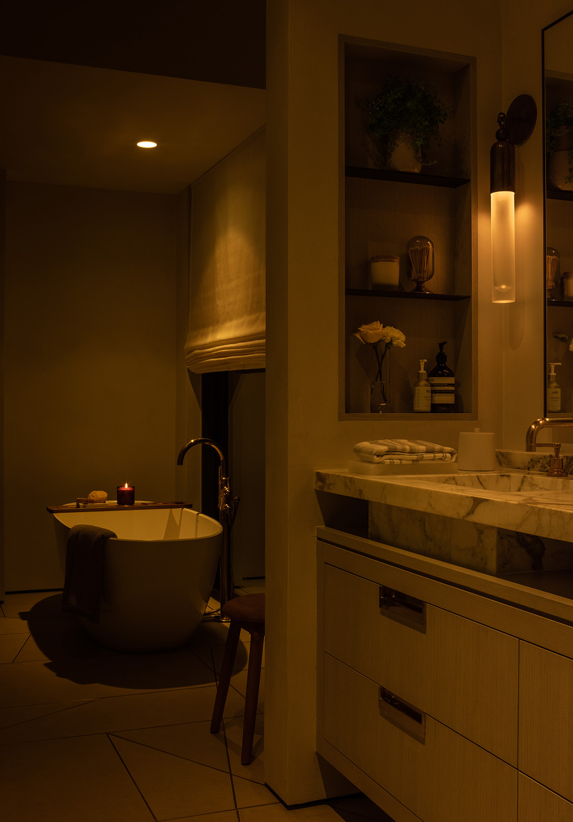 Dimmer switch in bathroom used to tailor light intensity to mood or task.