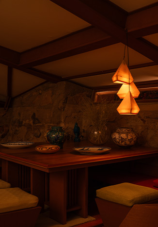 Close up of decorative light fixture in living room at Taliesin West powered by Ketra.