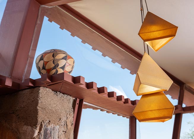 Decorative light fixture in living room at Taliesin West powered by Ketra.