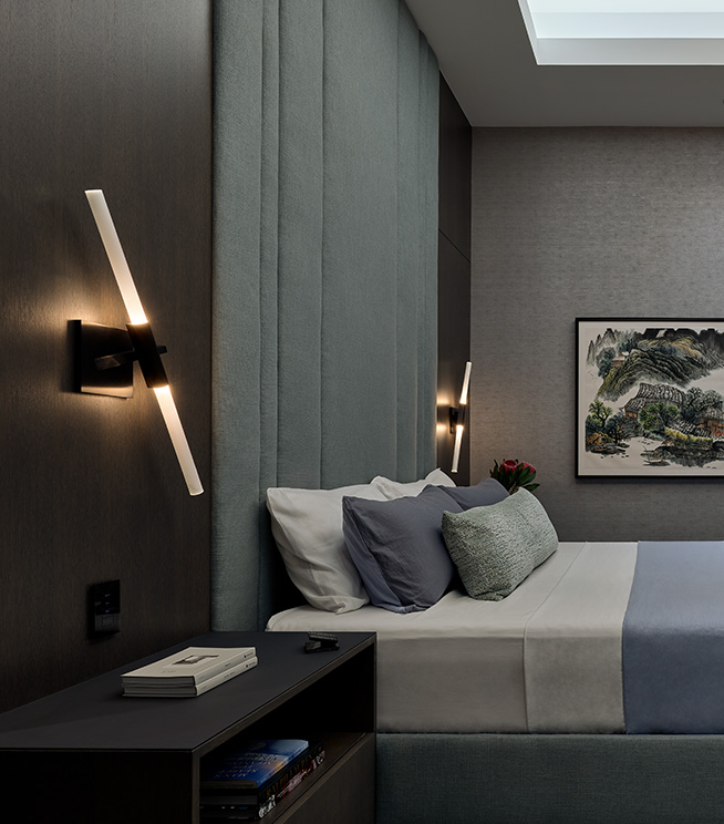 Ambient lighting layer in a bedroom with cove lighting in ceiling. Photo credit Frank Oudeman