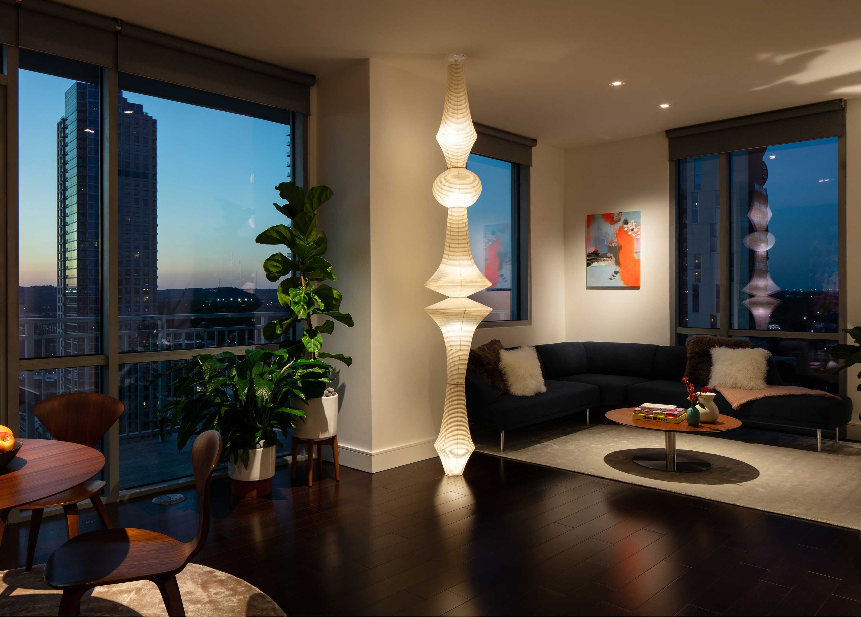 Full spectrum lighting with accent light in cool color temperature.