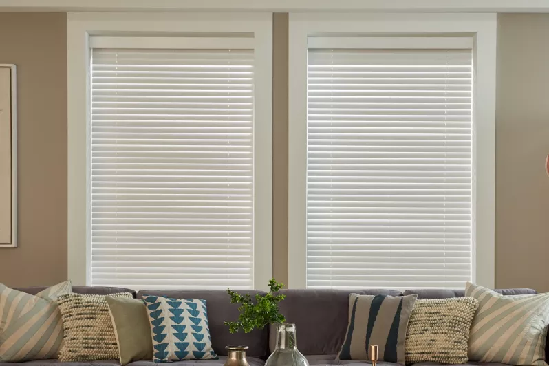 Wood blinds providing privacy in living room