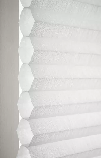 Close up of cellular shades air pocket showing honeycomb shape.