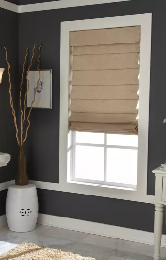 Roman shades in light-filtering fabric to baclance privacy and natural light in bathroom